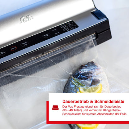 Frischer Fisch mit Zitrone im Vakuumbeutel – Solis Vakuumierer für Dauerbetrieb mit Schneideleiste
